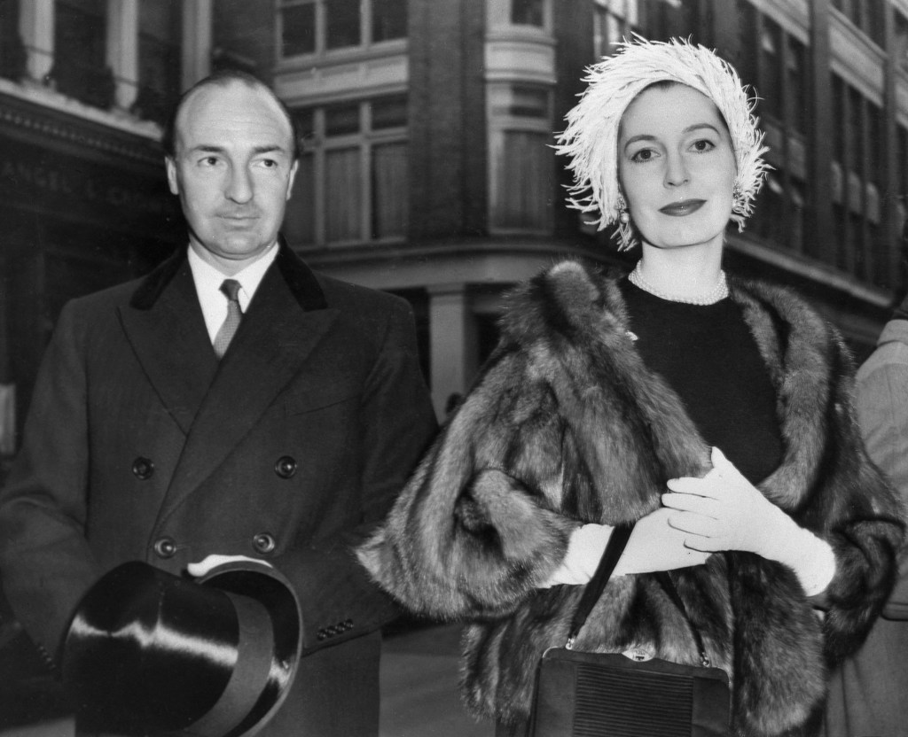 (FILES): This file picture taken in the 1960's of former British War State Secretary John Profumo and his wife Valerie Hobson at the time when he was at the centre of a Cold War sex and spying scandal that cost him his political career. A London hospital announced 10 March 2006 that Profumo, died overnight aged 91. In 1963, Profumo was the war minister in the cabinet of Conservative Prime Minister Harold MacMillan when he left in disgrace after lying to the House of Commons over his affair with call girl Christine Keeler. AFP FILES (Photo by AFP) (Photo by -/AFP via Getty Images)